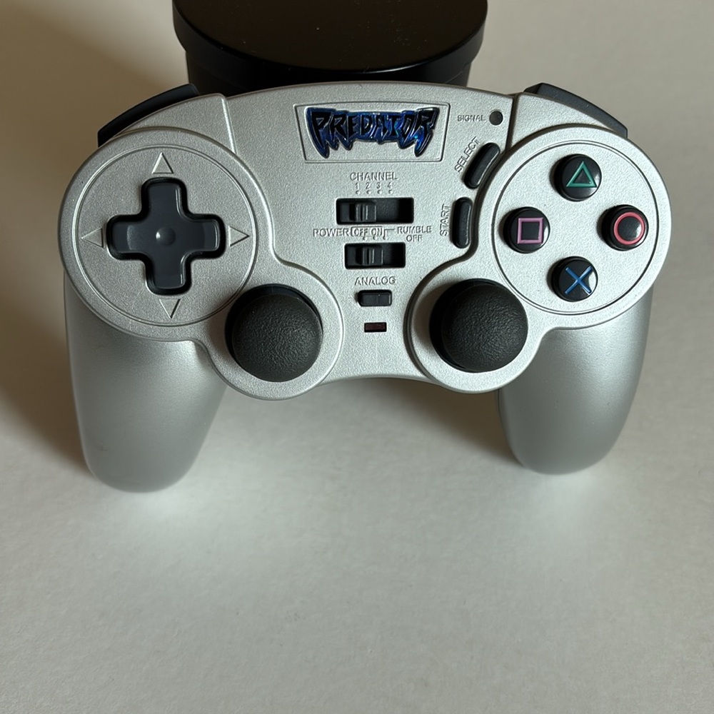 Silver Pelican Predator wireless controller for the PlayStation 2 (PS2)
